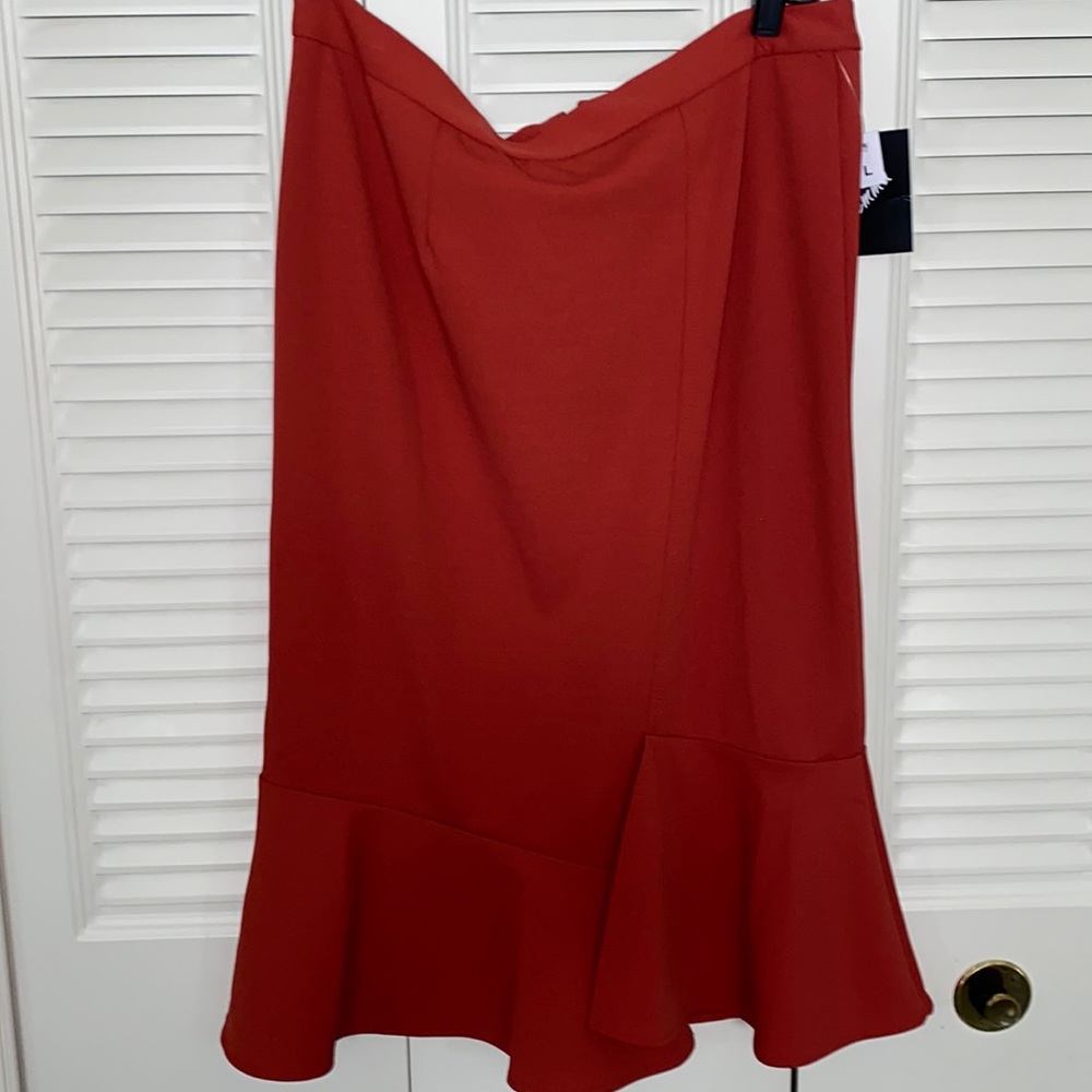 NWT orange skirt form fitting with ruffles
